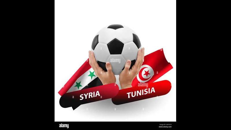Cầu thủ Tunisia đang tung cú sút mạnh vào khung thành của Syria trong trận đấu Cầu thủ Tunisia đang tung cú sút mạnh vào khung thành của Syria trong trận đấu
